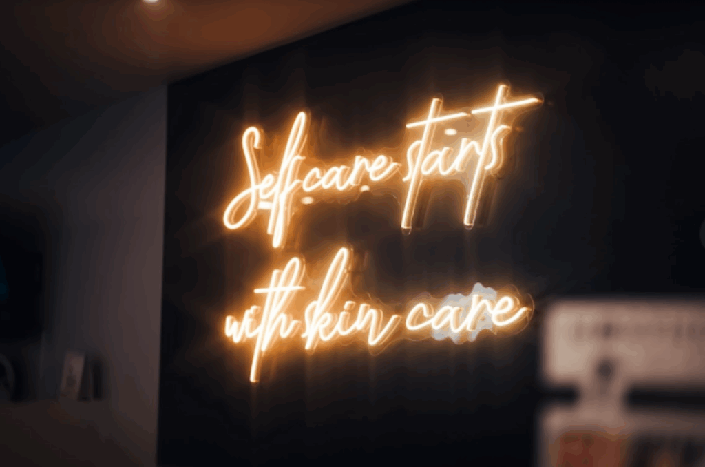 Self care starts with skin care neon sign in clinic